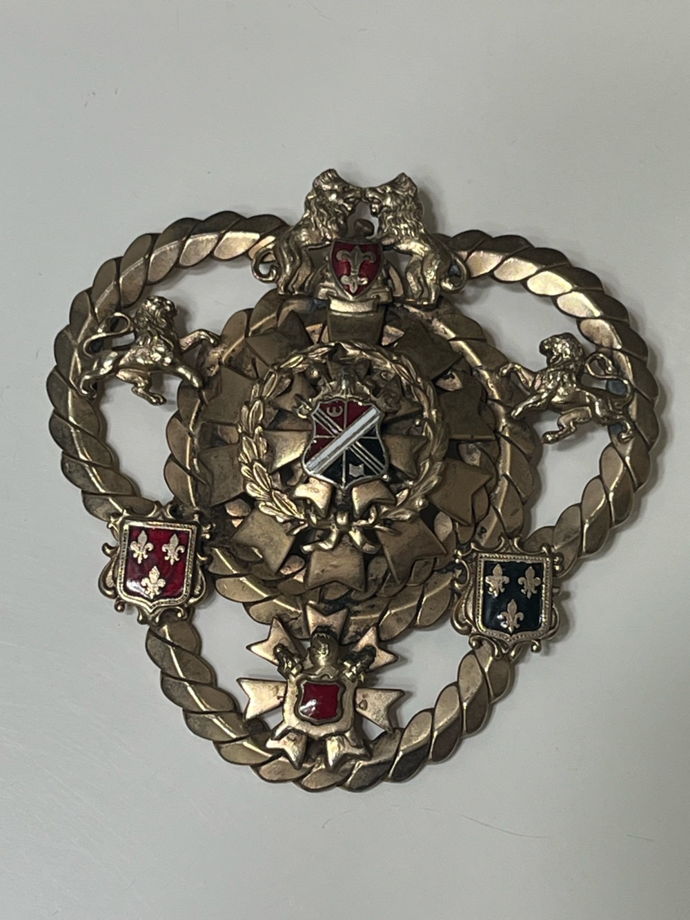 Decorative Silver-tone Heraldic Brooch with Red and Black Enamel Accents